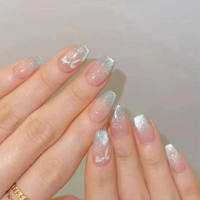 Lot de 24 faux ongles à pression bleu lait style français, paillettes, amande, œil de chat, avec nœuds, décoration diamant, charmants