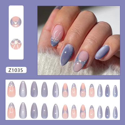 Lot de 24 faux ongles à pression bleu lait style français, paillettes, amande, œil de chat, avec nœuds, décoration diamant, charmants